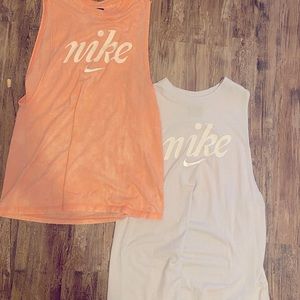 Two Nike tank tops